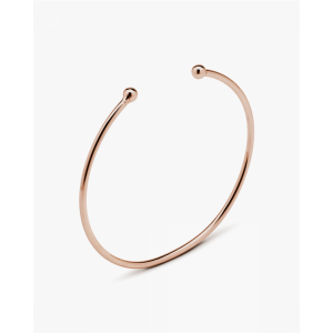 Un piccolo braccialetto piercing con sfere in oro rosa dal design personalizzato realizzato in oro vermeil con perle